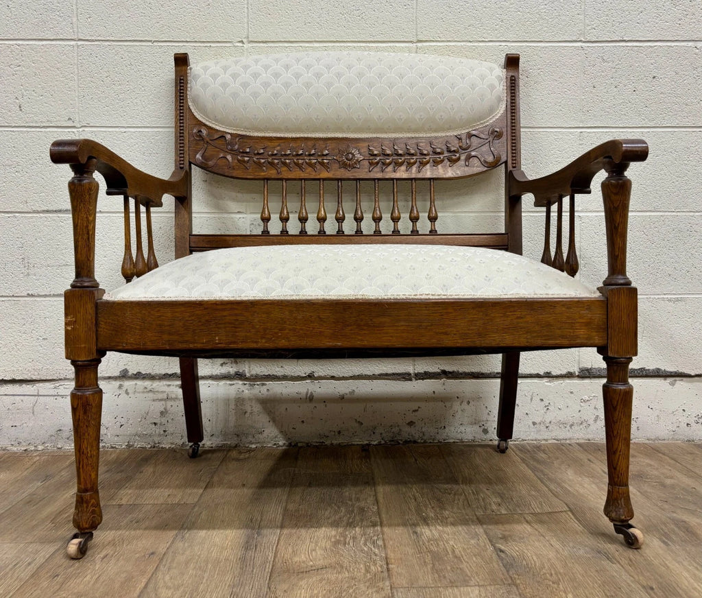 Antique Carved Spindle Back Carved Upholstered Settee