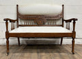 Antique Carved Spindle Back Carved Upholstered Settee