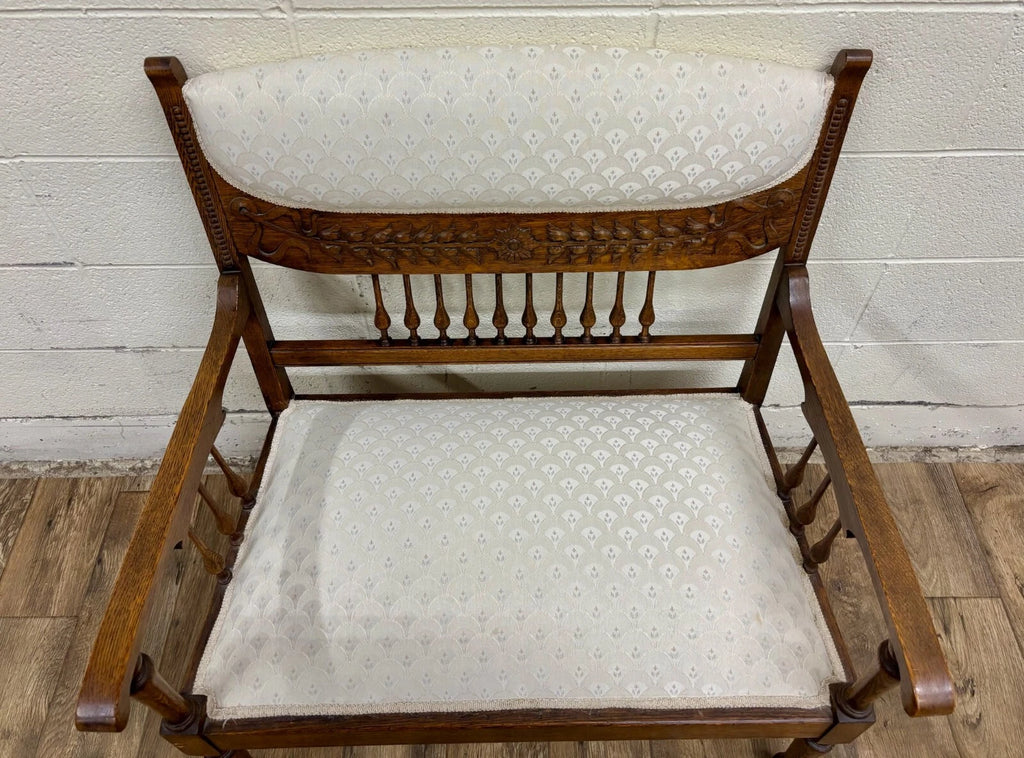 Antique Carved Spindle Back Carved Upholstered Settee