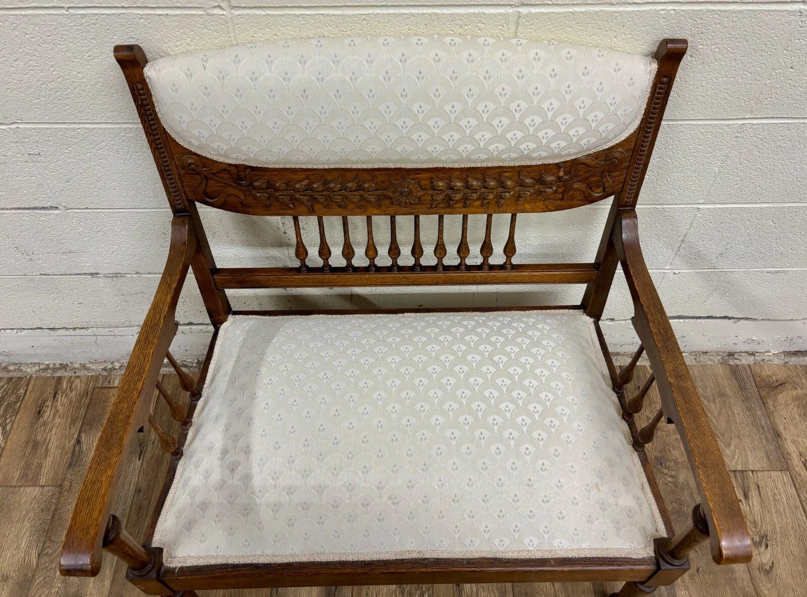 Antique Carved Spindle Back Carved Upholstered Settee