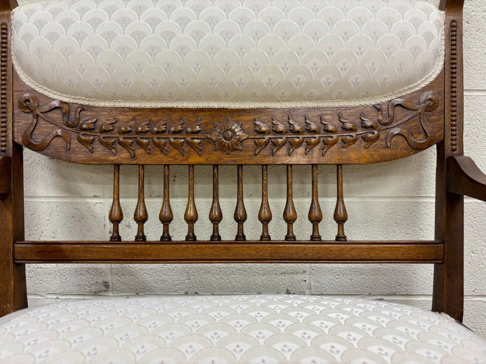 Antique Carved Spindle Back Carved Upholstered Settee