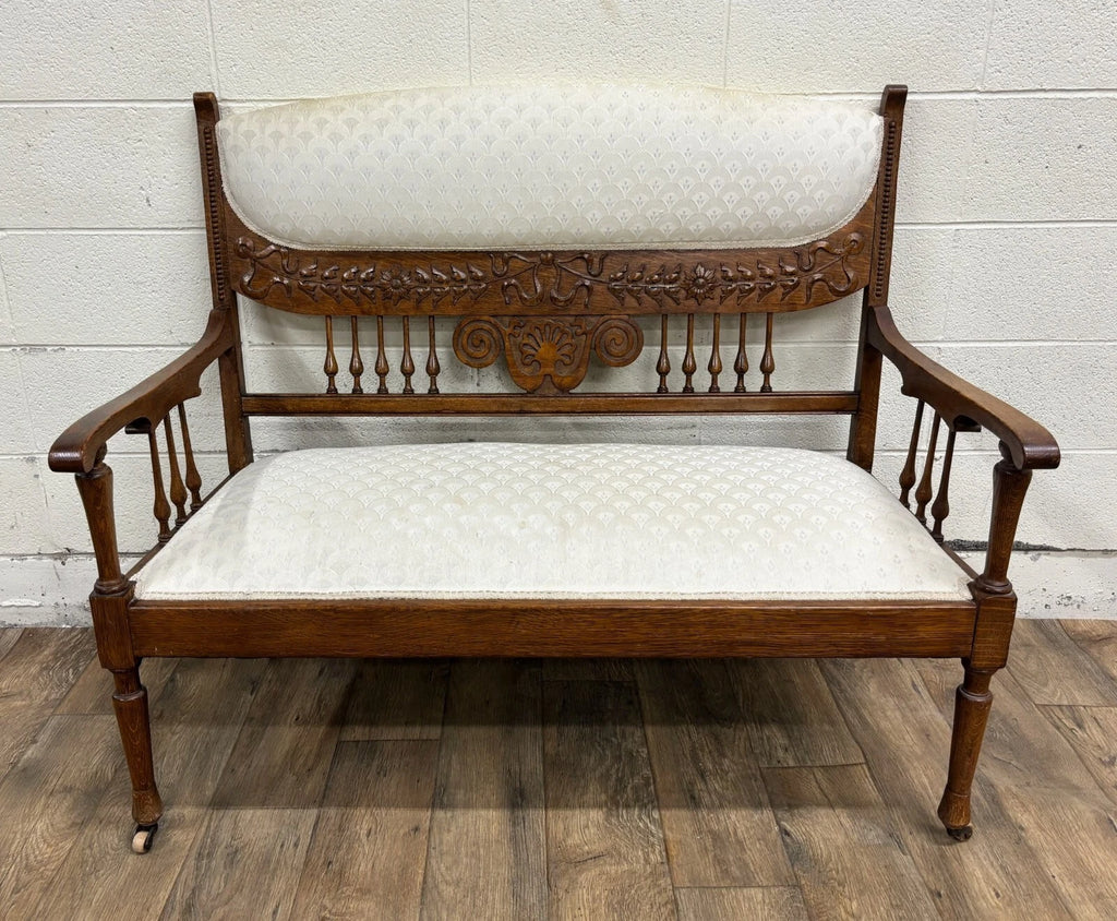 Antique Carved Spindle Back Carved Upholstered Settee