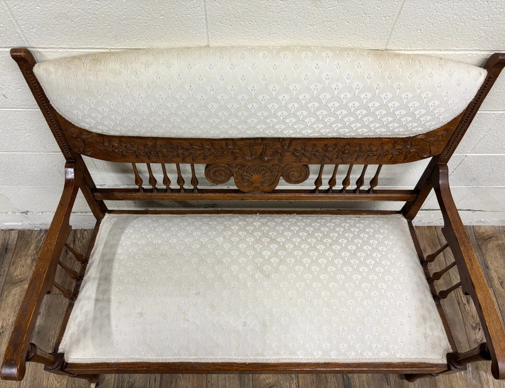 Antique Carved Spindle Back Carved Upholstered Settee