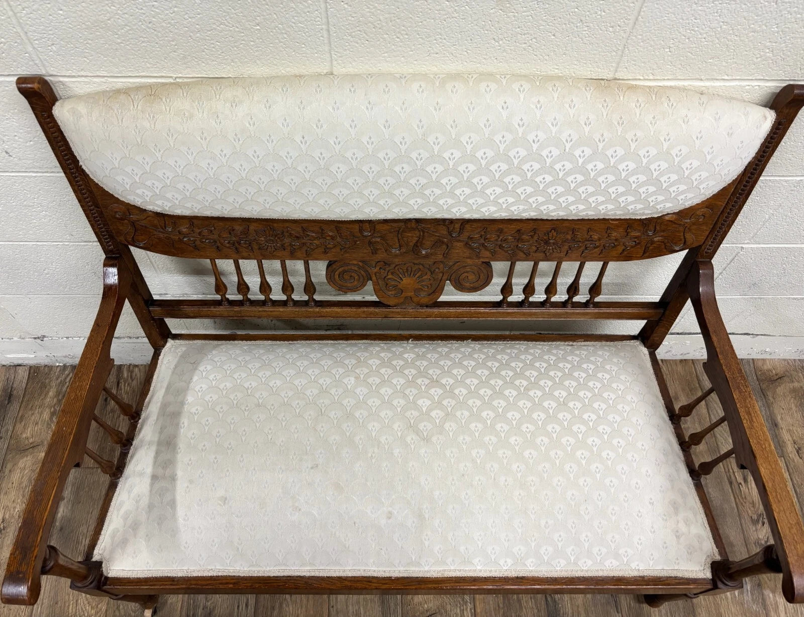 Antique Carved Spindle Back Carved Upholstered Settee
