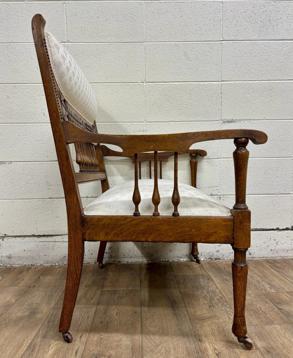 Antique Carved Spindle Back Carved Upholstered Settee