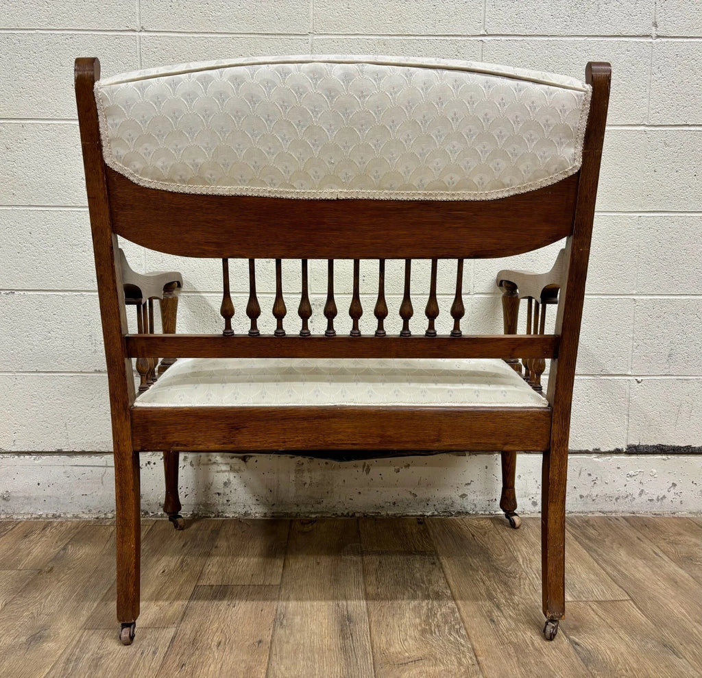 Antique Carved Spindle Back Carved Upholstered Settee