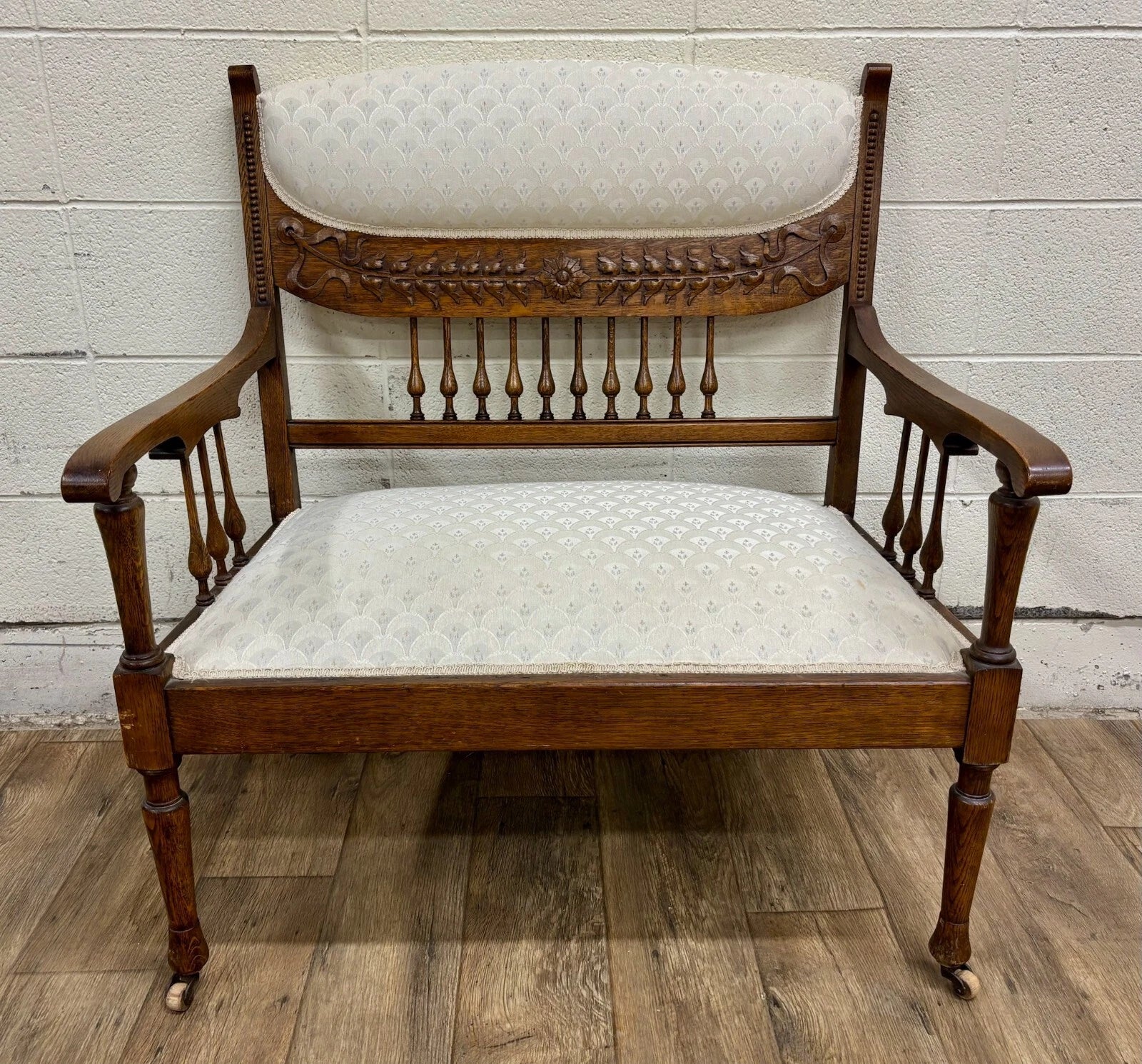 Antique Carved Spindle Back Carved Upholstered Settee