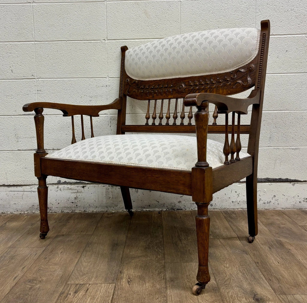 Antique Carved Spindle Back Carved Upholstered Settee