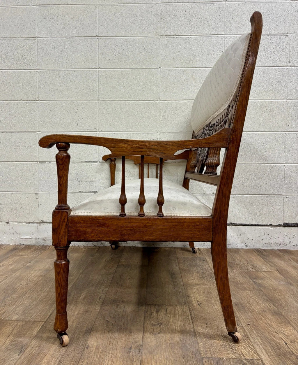 Antique Carved Spindle Back Carved Upholstered Settee