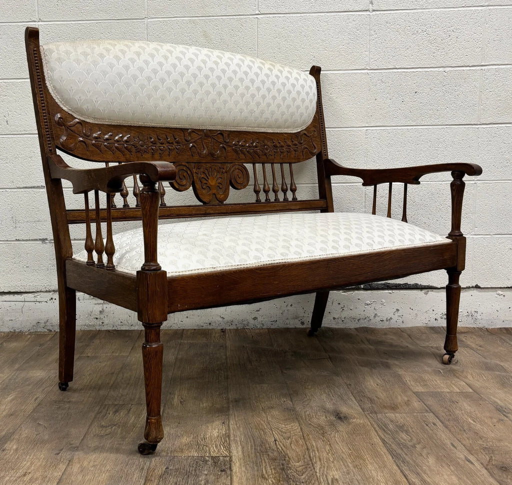 Antique Carved Spindle Back Carved Upholstered Settee